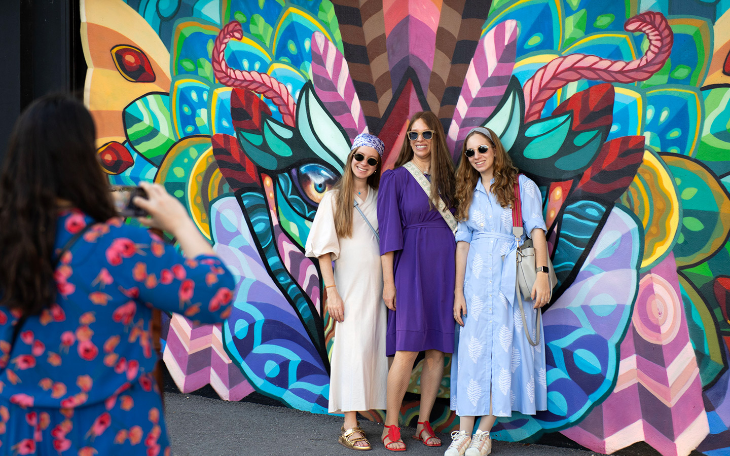 1773759267805_3_Ladies_by_mural_Wynwood_Walls_1440x900