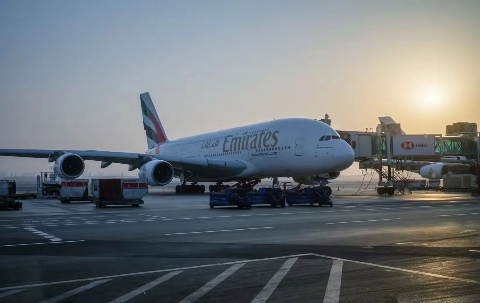 1789049818029_an emirates airlines airbus a380 commercial airliner is parked at dubai airport